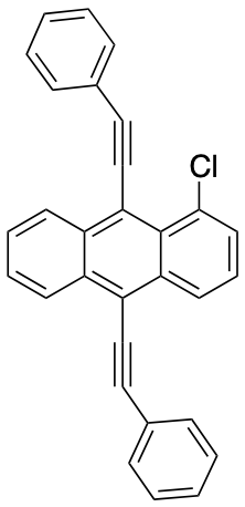 1-Chloro-9,10-bis(2-phenylethynyl)anthracene